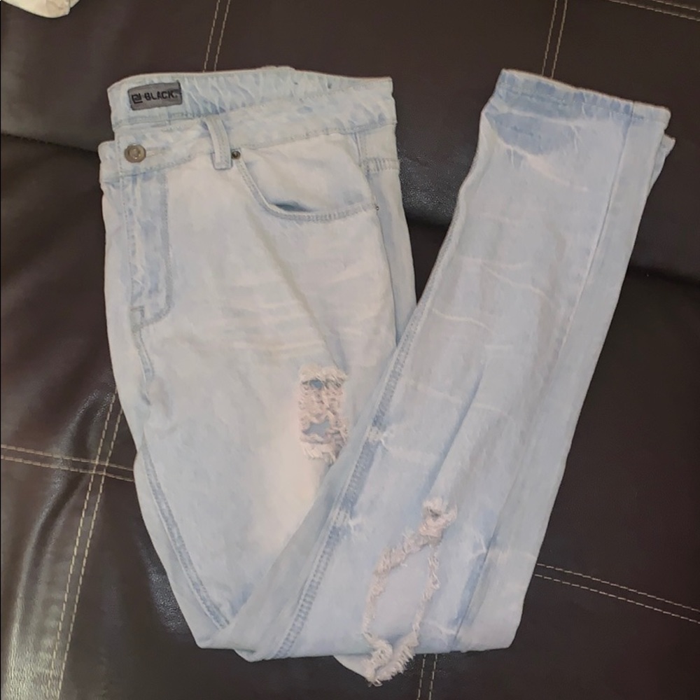 Light colored ripped skinny jeans